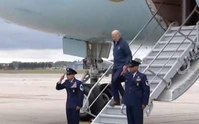 Watch: Biden Almost Falls Down Steps On Same Day As Report About Handlers’ ‘Mission’ To Prevent Him Falling