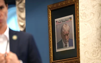 Trump Proudly Displays His Famous Framed Mug Shot Outside Oval Office oan