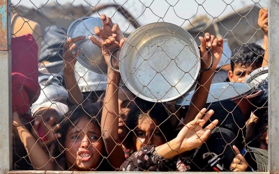 Israel announces ‘suspension of military activities’ in parts of Gaza to allow in ‘minimal’ humanitarian aid oan