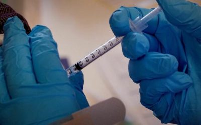 Health Care System To Pay More Than $1 Million To Settle COVID-19 Vaccine Mandate Case