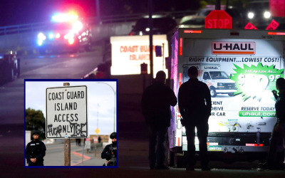 U.S. Coast Guard security officers fire on U-Haul truck driver reversing toward them at checkpoint gate oan