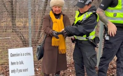 Scottish Police Arrest Serial Speaker: Elderly Woman Charged After Holding Sign Offering to Discuss Abortion