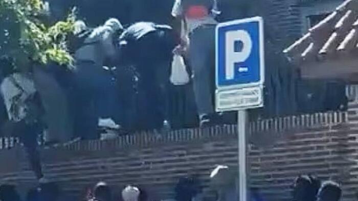 Watch: Migrants Are Literally Clambering Up Embassy Walls In Spain