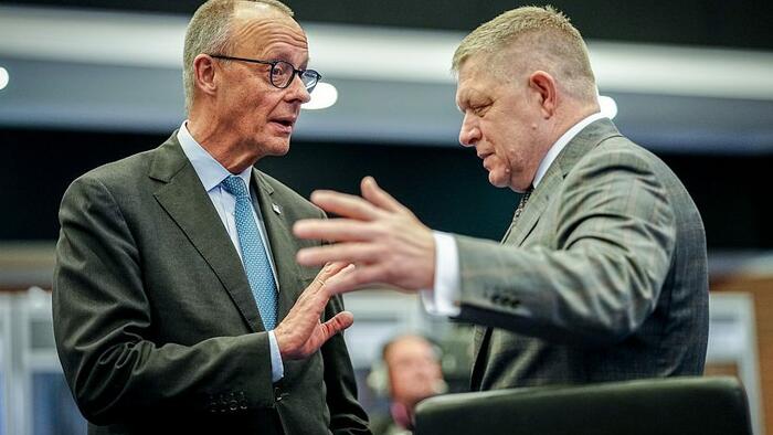 Merz Promises Fico A Spanking For Slovak Leader’s Moscow V-Day Trip