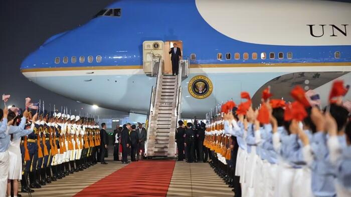Trump Says ‘Open Up China’ Before Landing In Beijing For Pomp-Filled Red Carpet Airport Welcome