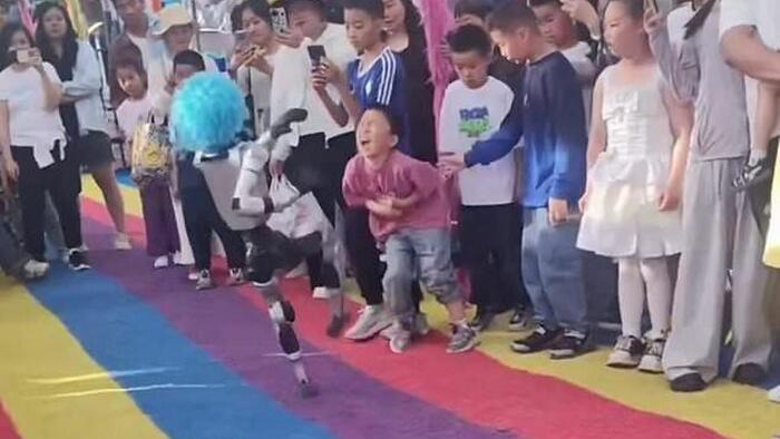 Viral: Humanoid Robot Kicks Chinese Kid In The Stomach During Public Demonstration