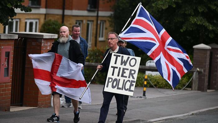 British Police Unit Flags Over 100 Social Media Posts For Arrest Amid Immigration Backlash